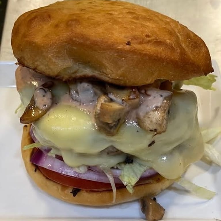 Indulge in Our Swiss Burger